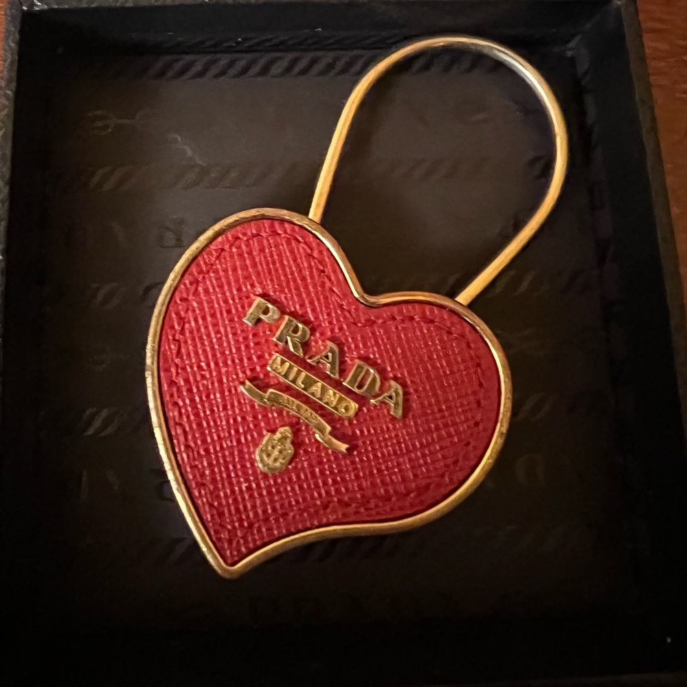 Authentic Prada metal keychain.